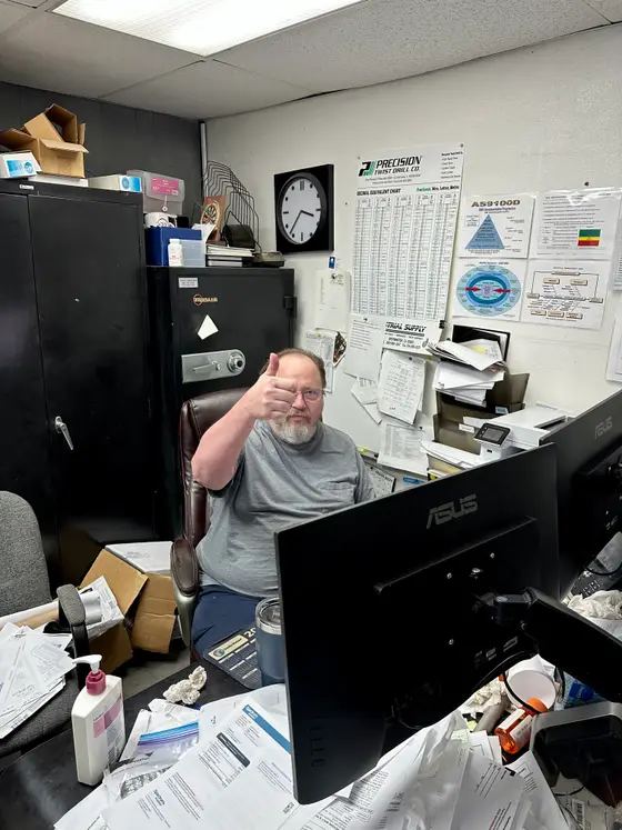 Satisfied CoreConnectIT customer giving a thumbs up