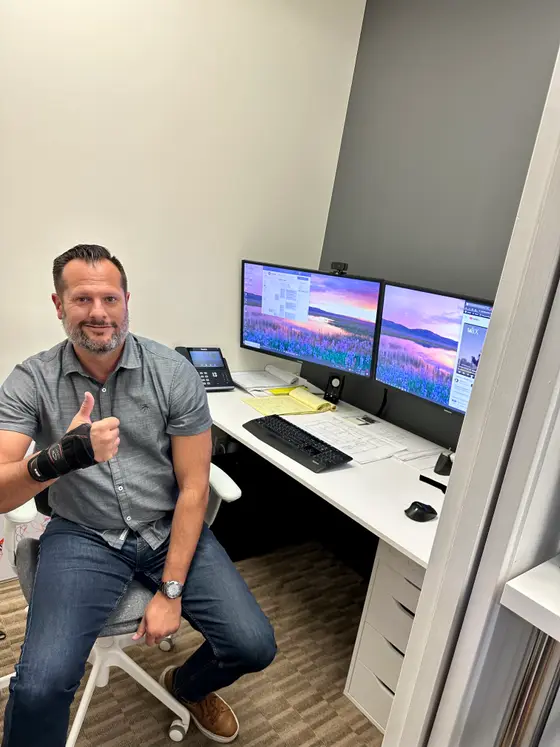 Satisfied CoreConnectIT customer giving a thumbs up