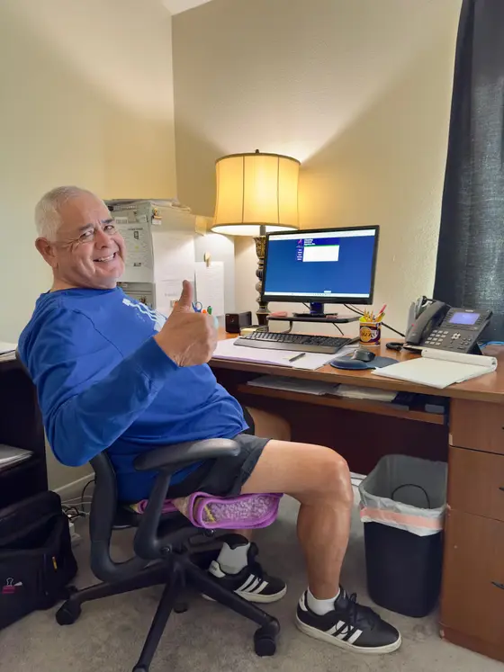 Satisfied CoreConnectIT customer giving a thumbs up