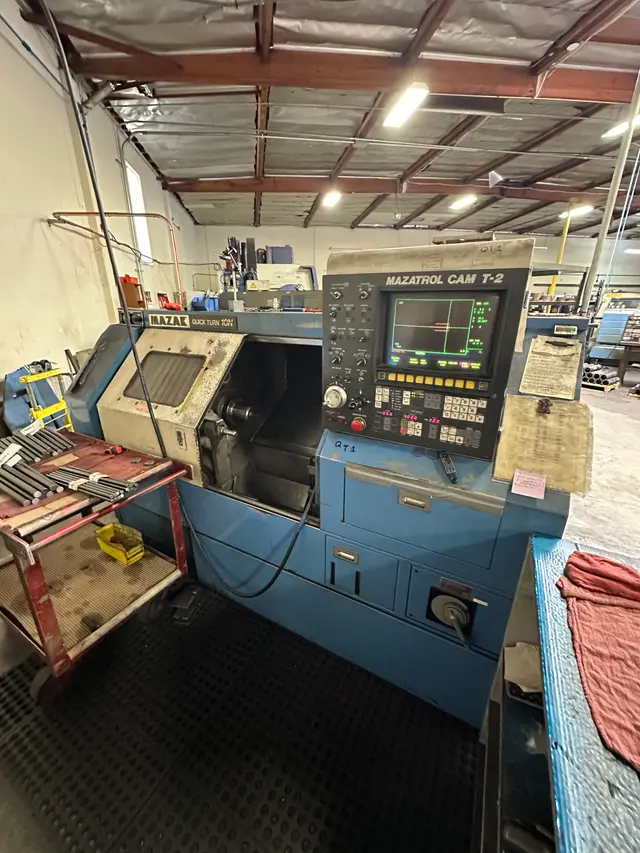 Shop-floor CNC machine with integrated control monitor