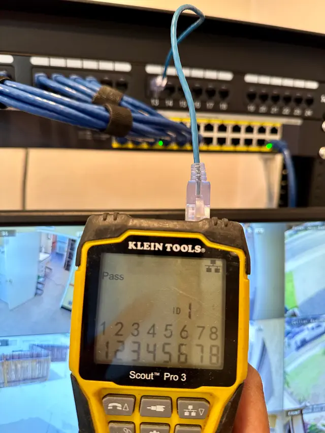 Cable tester verifying a terminated network run at a patch panel