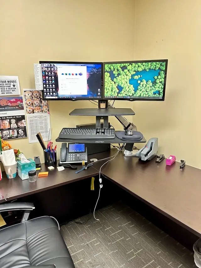 Sit-stand desk converter workstation installed for a client